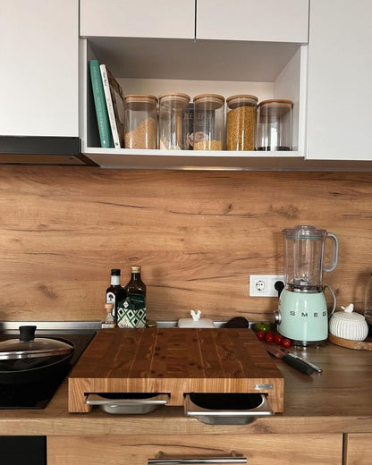 Professional wooden kitchen board made of oiled oak with two stainless steel containers.